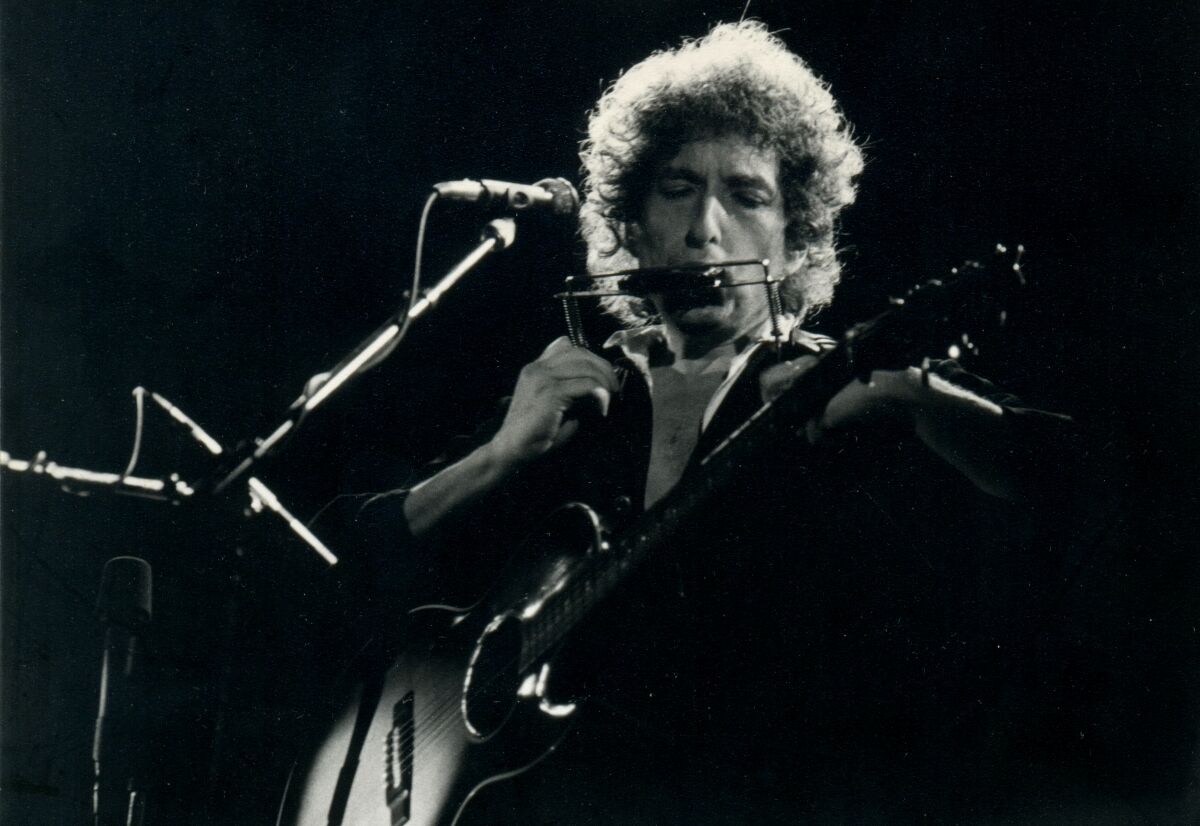 Bob Dylan et son fidèle harmonica 
