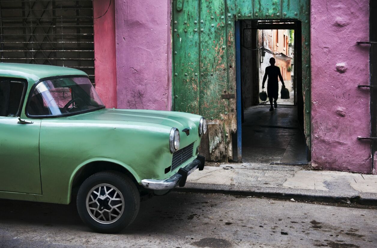 Man Walks in Alleyway. Havana, Cuba, 2010.
